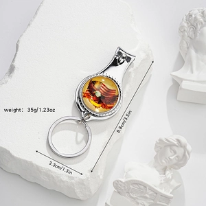 Detail of multi-functional American flag eagle nail clipper with key ring dimensions