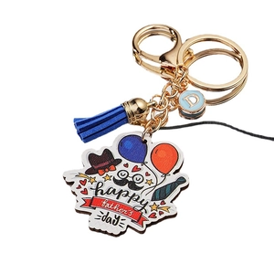 Father's Day cartoon keychain with blue tassel and happy father's day printed pendant