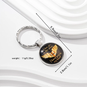 Memorial baby footprints keychain with glass cabochon pendant and size measurements
