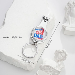 Macro shot of stainless steel nail clipper keychain with America's #1 DAD emblem detail
