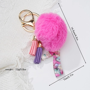 Portachiavi con pompon rosa, numero in resina floreale e nappe, lunghezza 14,5 cm