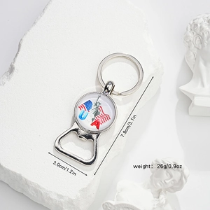 Detail view of silver multi-functional bottle opener keychain with USA flag design