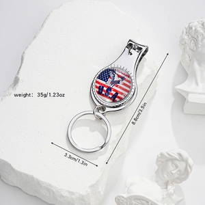 Detail view of multifunctional nail clipper keychain with American eagle and flag design