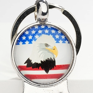 American flag bottle opener keychain with bald eagle emblem and glass dome pendant