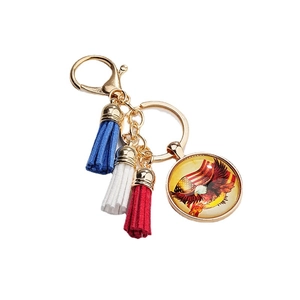 Eagle pendant keychain with American flag glass cabochon and colorful tassels