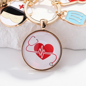 Porte-clés infirmière doré avec breloques médicales, masque et pendentif électrocardiogramme