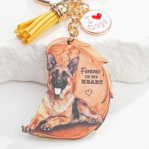 German Shepherd acrylic keychain with angel wings design, golden ring and yellow tassel