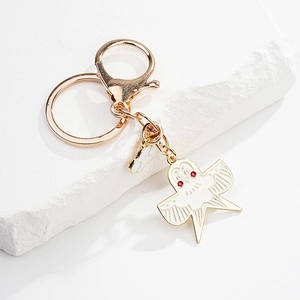 Porte-clés hirondelle en métal de style chinois avec pendentif oiseau émaillé blanc