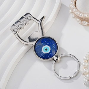 Blue Evil Eye bottle opener keychain with silver alloy finish and classic Nazar charm design