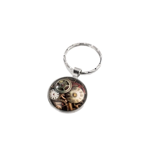 Vintage steampunk keychain with glass gem pendant showing retro clock gears and Roman numerals