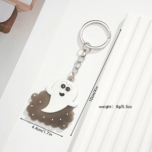 Detail view of cartoon ghost keychain with dimensions 10cm length and 4.4cm width
