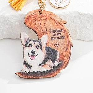 Detail of Corgi dog acrylic keychain with Forever In My Heart text and yellow tassel