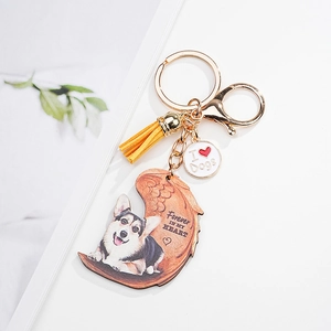 Cute corgi dog acrylic keychain with angel wings, yellow tassel and heart pendant
