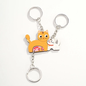 Creative puzzle cat wooden keychain set with orange and white kitten interlocking pieces