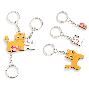 Creative interlocking cat wooden keychains featuring orange, white and pink kittens