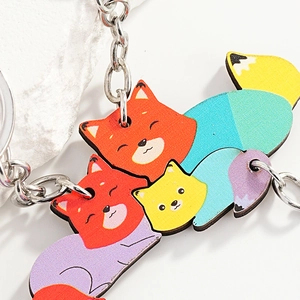 Three-piece cute wooden fox keychain set with colorful animal charms and silver rings