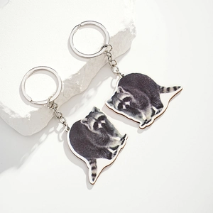 Creative wooden raccoon keychains with realistic animal prints and silver metal rings