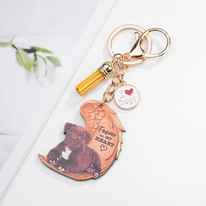 Dog memorial keychain with brown puppy acrylic tag, yellow tassel and heart charm