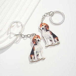 Set of two realistic Beagle dog wooden keychains with silver metal rings and white base