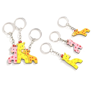 Cute cartoon giraffe wooden keychain set in yellow and pink colors with metal rings