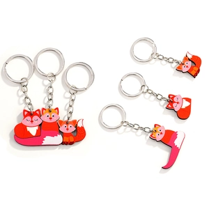 Cute set of 4 acrylic fox keychains with vibrant colors and silver metal rings