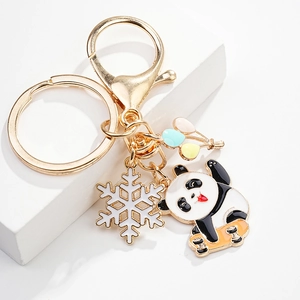 Cute panda skateboard keychain with colorful balloons and snowflake charm pendants