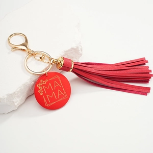 Red leather tassel keychain with gold MAMA engraved charm and polished metal D-ring clasp
