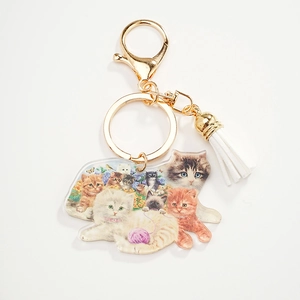 Simpatico portachiavi in acrilico con gatto, anello dorato e nappa bianca per borse