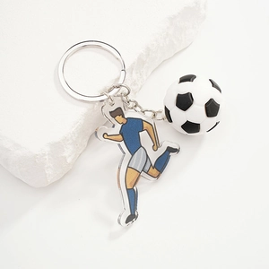 3D soccer keychain featuring athlete pendant and miniature football on a sleek metal ring
