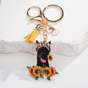 Custom Doberman keychain featuring sunflower bandana, leather tassel, and name field