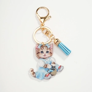 Cute acrylic tabby cat keychain with blue bow, checkered dress and sky blue tassel