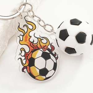 3D soccer ball keychain with flaming acrylic tag on a polished silver metal ring