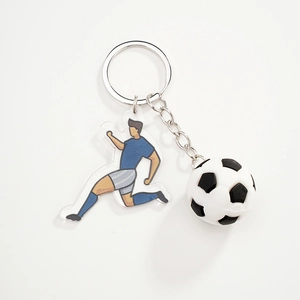 3D soccer ball keychain with blue jersey athlete pendant and polished silver ring