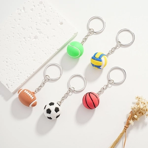 Five assorted sports ball keychains set with tennis, volleyball, rugby, soccer and basketball
