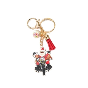 Christmas Santa Claus on motorcycle keychain with red tassel and sequin star ball charm