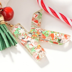 Porte-clés de Noël lettre K en résine avec bonhomme de neige et pompon vert festif