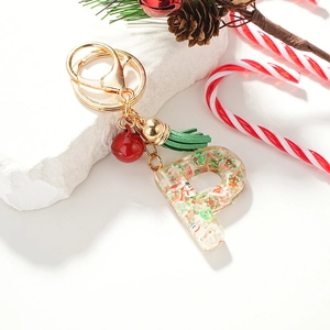 Porte-clés de Noël Lettre P en résine avec fermoir doré et breloques festives