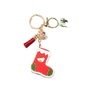 Christmas stocking keychain with polar bear pattern and colorful star sequin ball