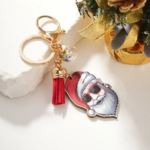Christmas Santa keychain with sunglasses, red tassel, and sparkling sequin glass ball charm
