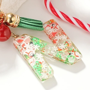Porte-clés lettre N en résine thème Noël avec figurines bonhomme de neige et pompon