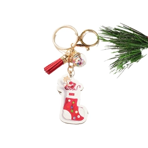 Christmas DIY keychain with reindeer in sock pendant and colorful sequin star ball