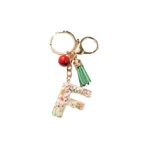Christmas resin alphabet F keychain with snowman decor, red bell and green tassel