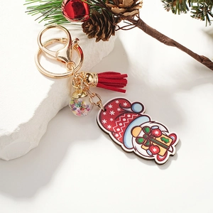 Porte-clés Père Noël en bois avec pompon rouge et boule de verre à paillettes colorées