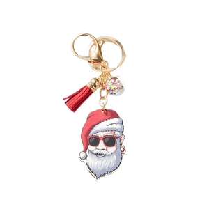Creative Santa Claus keychain with black sunglasses, red tassel and star glitter ball