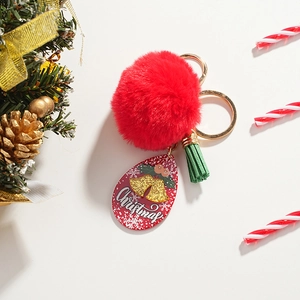 Porte-clés de Noël avec pompon rouge, gland vert et breloque cloche dorée mignonne
