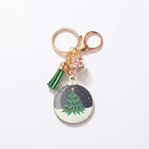 Christmas tree wooden pendant keychain with green tassel and starry snow globe charm