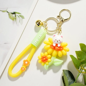 Porte-clés Chat Tournesol Mignon Avec Dragonne en Silicone et Clochette Dorée Pendentif de Sac Chaton en Résine pour Femmes