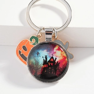 Halloween DIY keychain with purple castle glass pendant, orange pumpkin and ghost charms