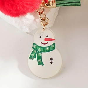 Christmas snowman keychain with red pompom, green tassel, and gold metal key ring