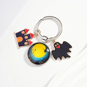Halloween keychain with moon witch glass cabochon, castle and ghost metal charms